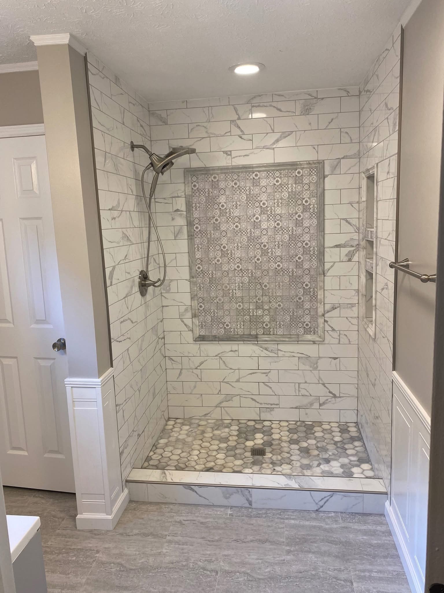 Marble Shower with Mosaic Niche