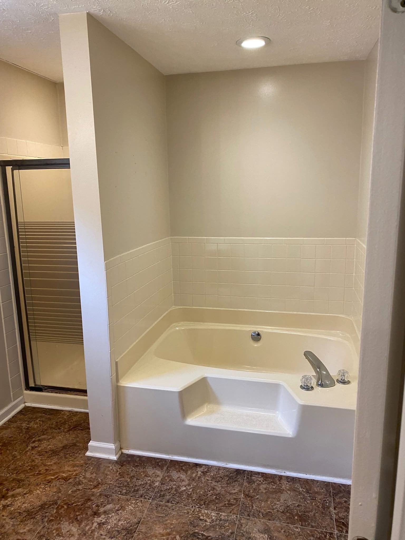 Before: Marble Shower with Mosaic Niche