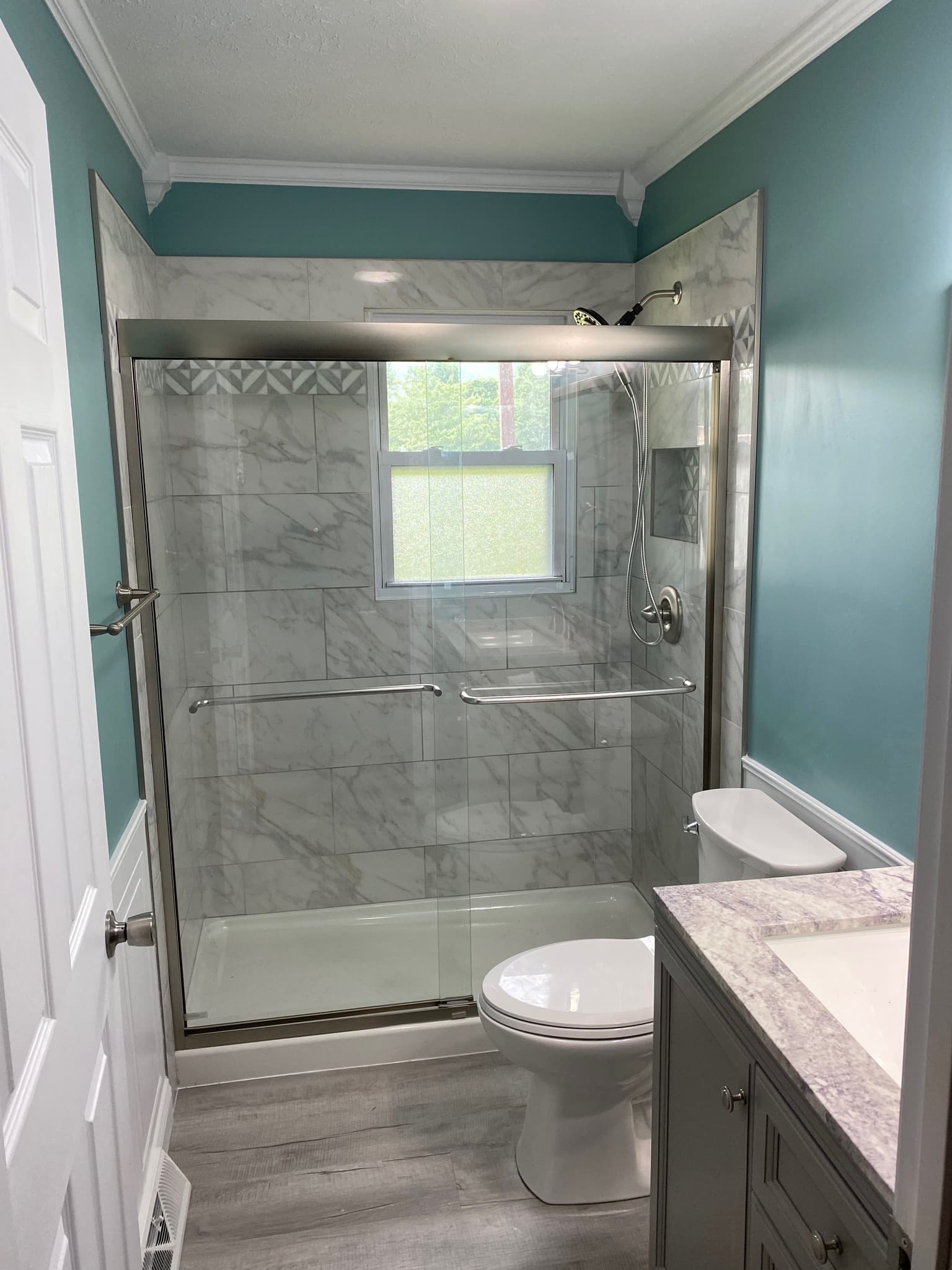 Marble Shower with Patterned Border