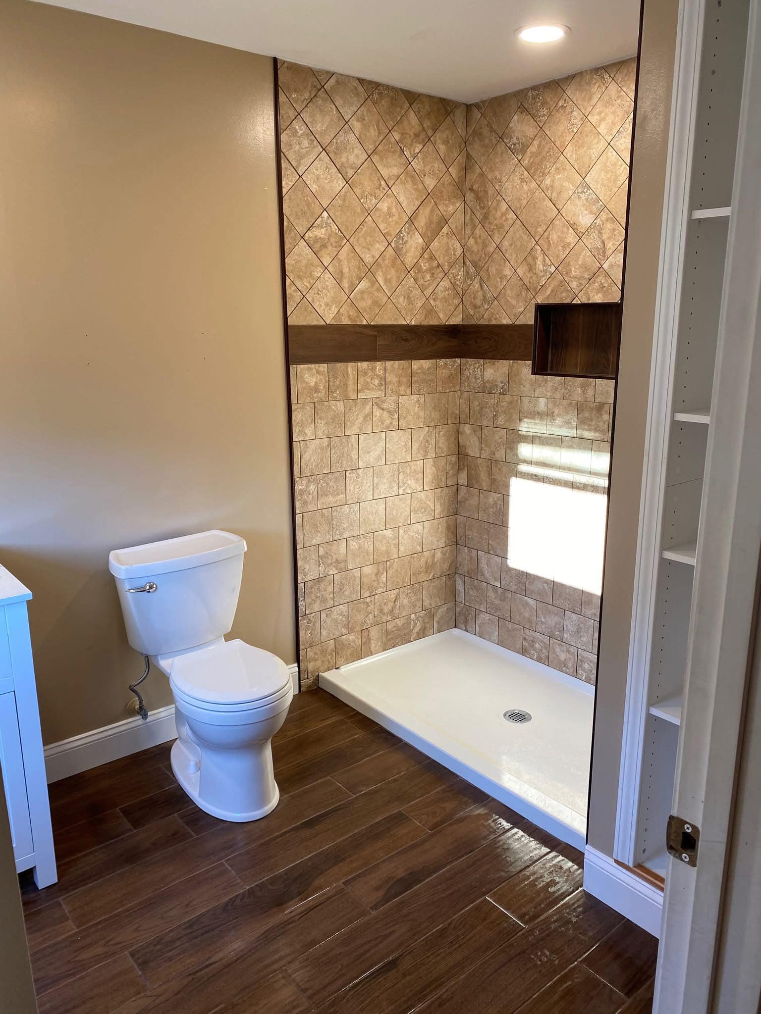 Travertine Shower with Diamond Inlay