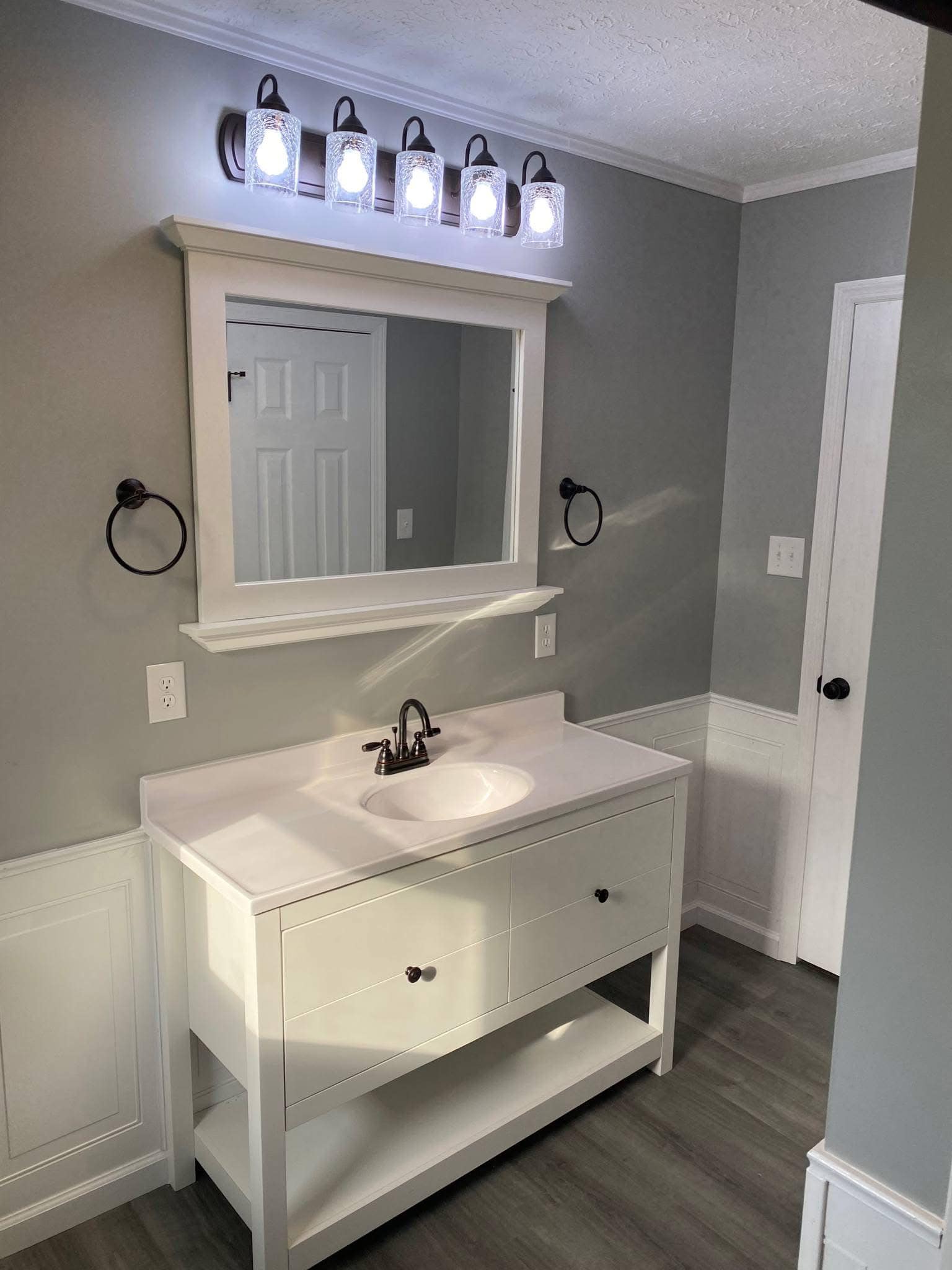 White Vanity with Vintage Sconces