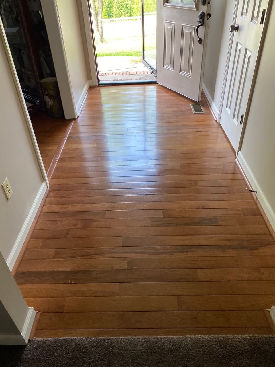 Before: Marble-Look Tile Entryway