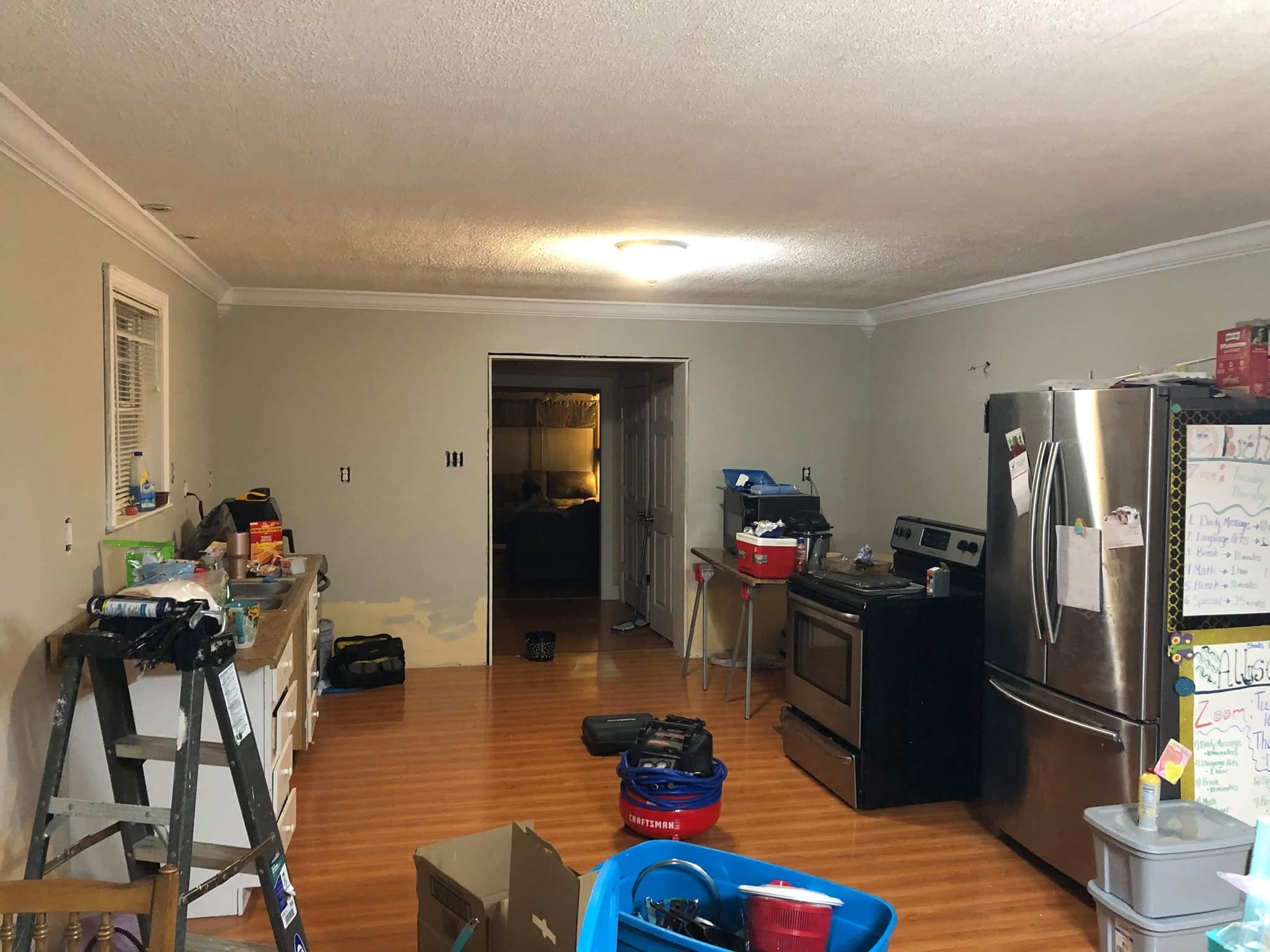 Before: Cream Kitchen with Granite Island